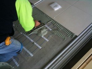 Укладка тёплого пола в плиточный клей